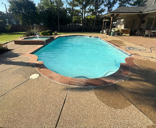 Backyard pool before renovation without modern features
